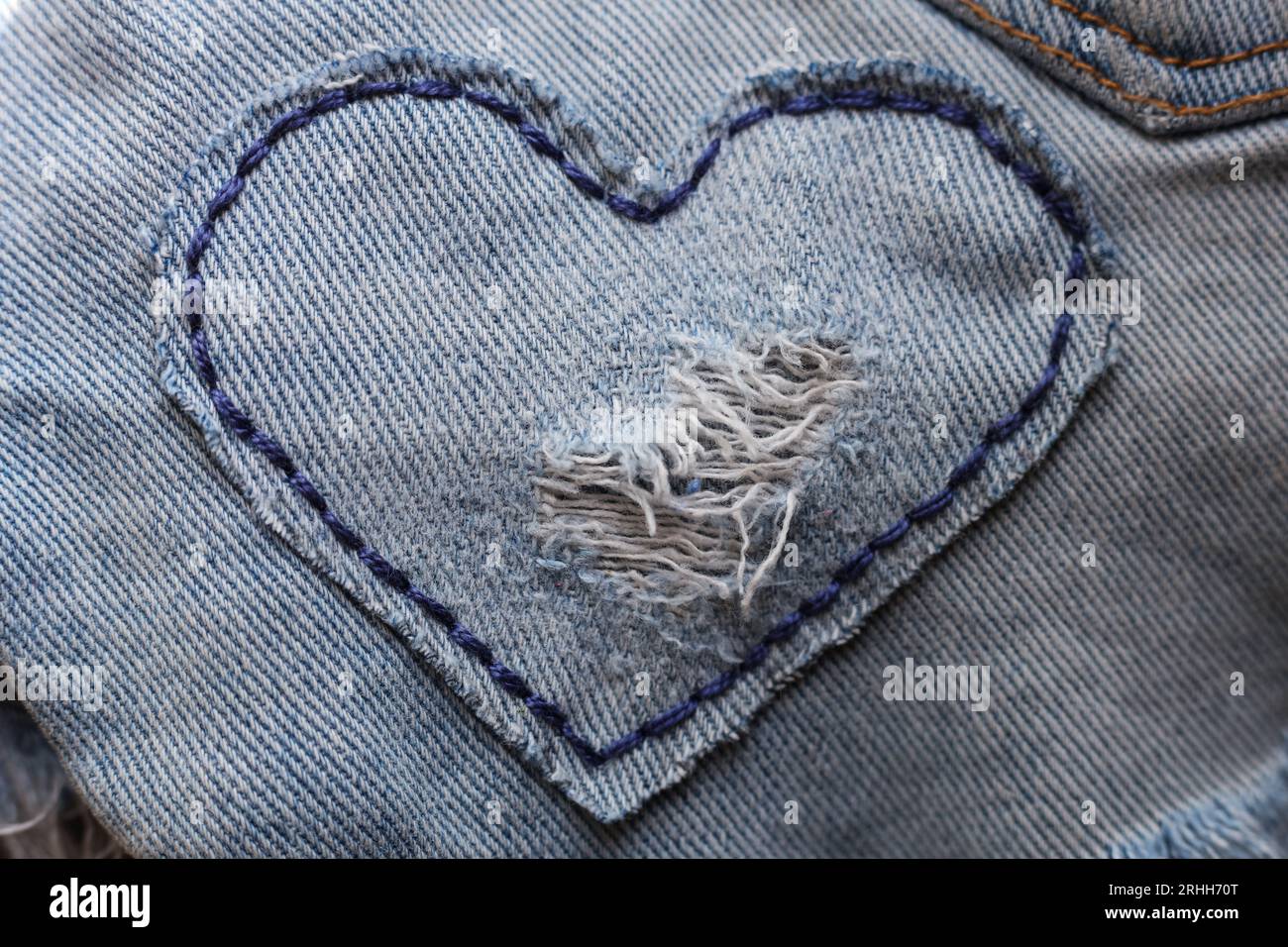 heart shaped patch on jeans fabric Stock Photo Alamy