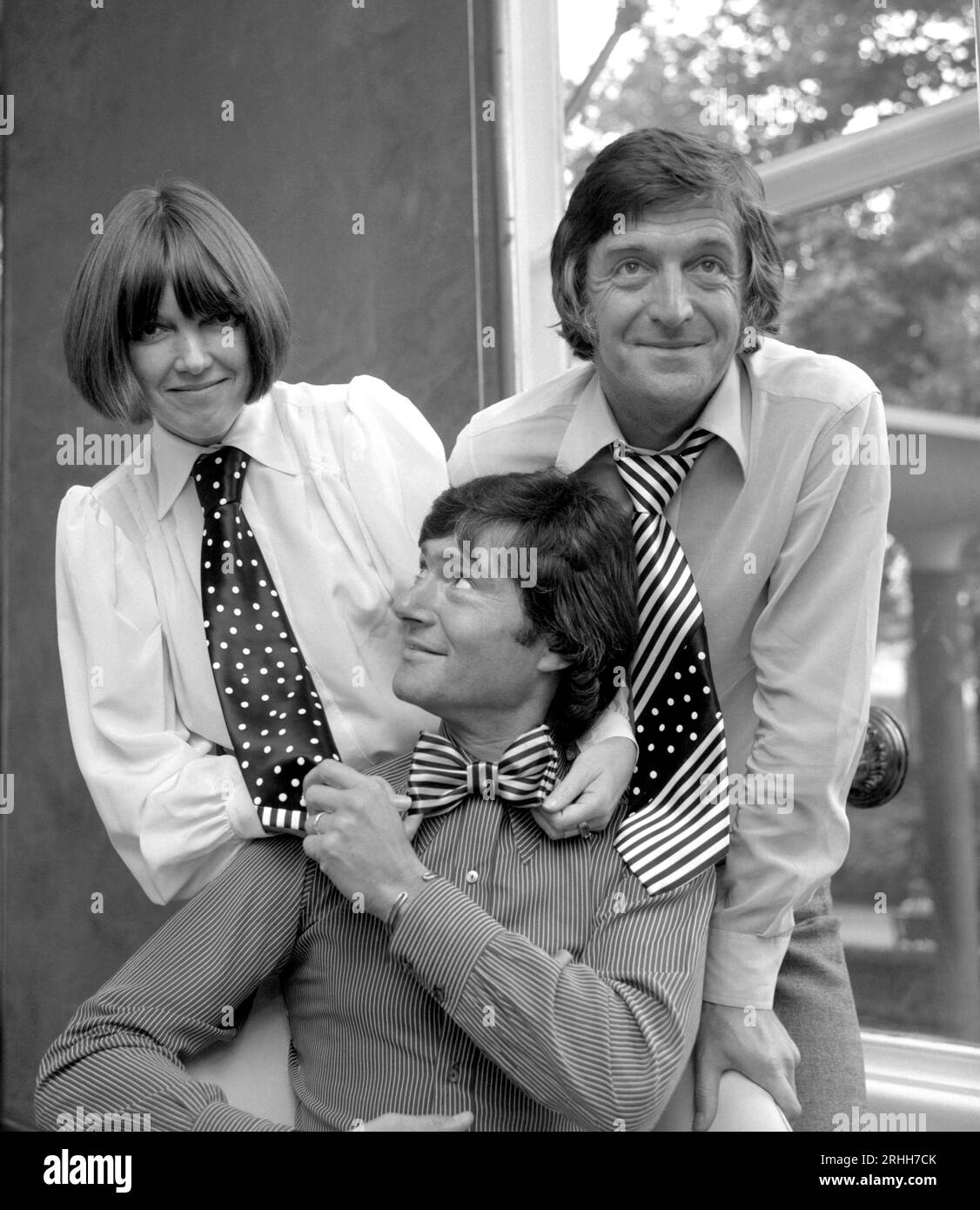 File photo dated 12/09/72 of fashion designer Mary Quant, assisted by hair stylist Vidal Sassoon, (centre), and tv personality Michael Parkinson, showing off some of the specimens in her latest venture, neckware for men. Sir Parkinson has died at the age of 88. Issue date: Thursday August 17, 2023. Stock Photo