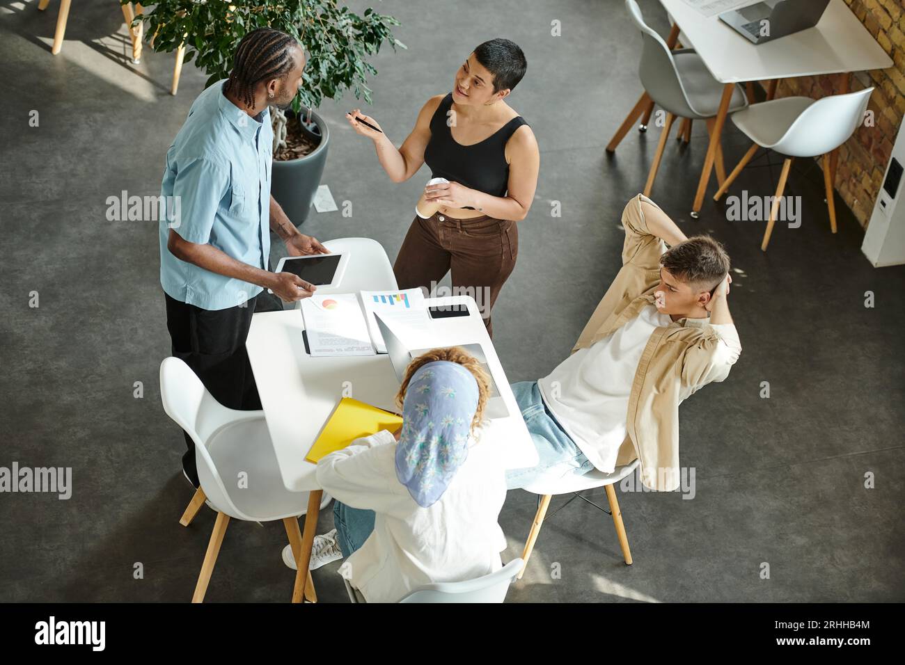 coworking, open space, multicultural business partners discussing ...