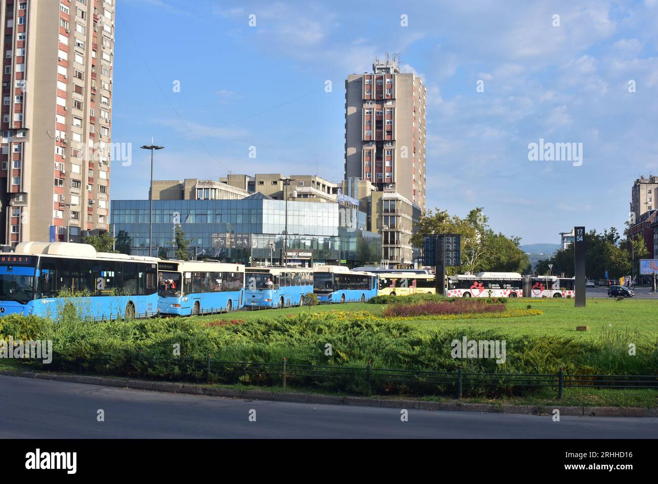 Public transport buses on a bus station. Mix of old and new, electric