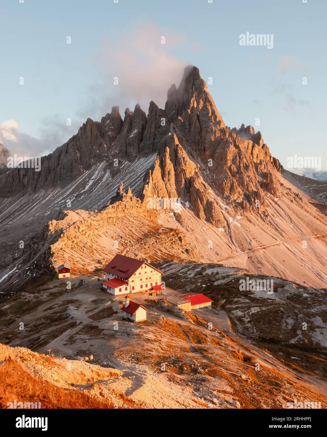 Tre Cime di Lavaredo and rifugio Locatelli in Dolomite Alps during sunset. Three peaks of Lavaredo, Dolomites, South Tyrol, Italy, Europe. Landscape photography Stock Photo