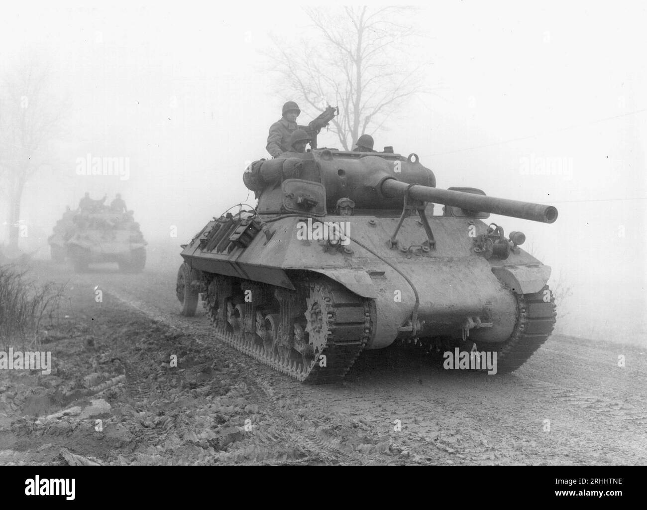 BELGIUM - December 1944 - A column of US Army tanks advances through Belgium, during a major German counter-attack which later became known as the 'Ba Stock Photo
