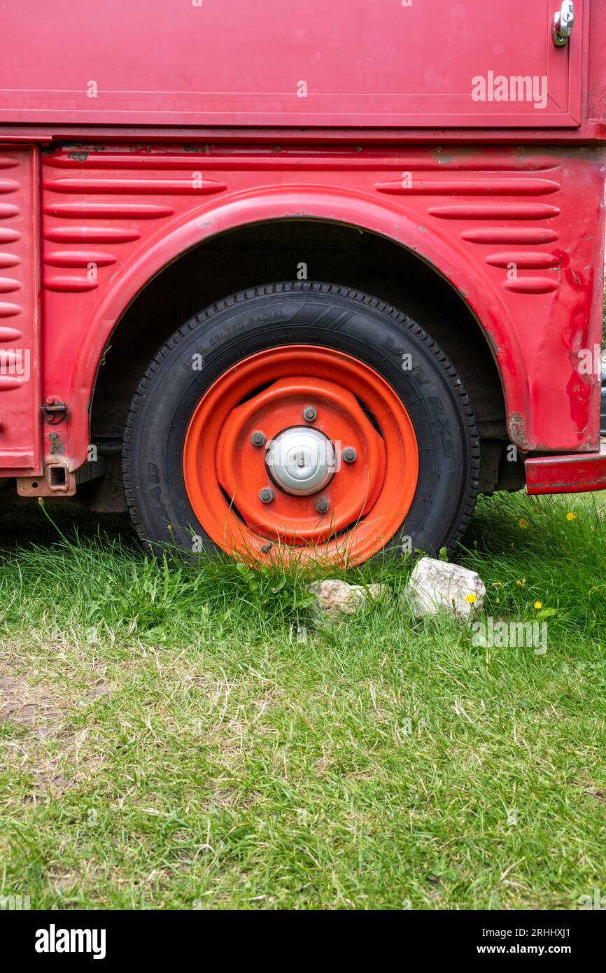 Vintage red wheels on a Citroen van Stock Photo