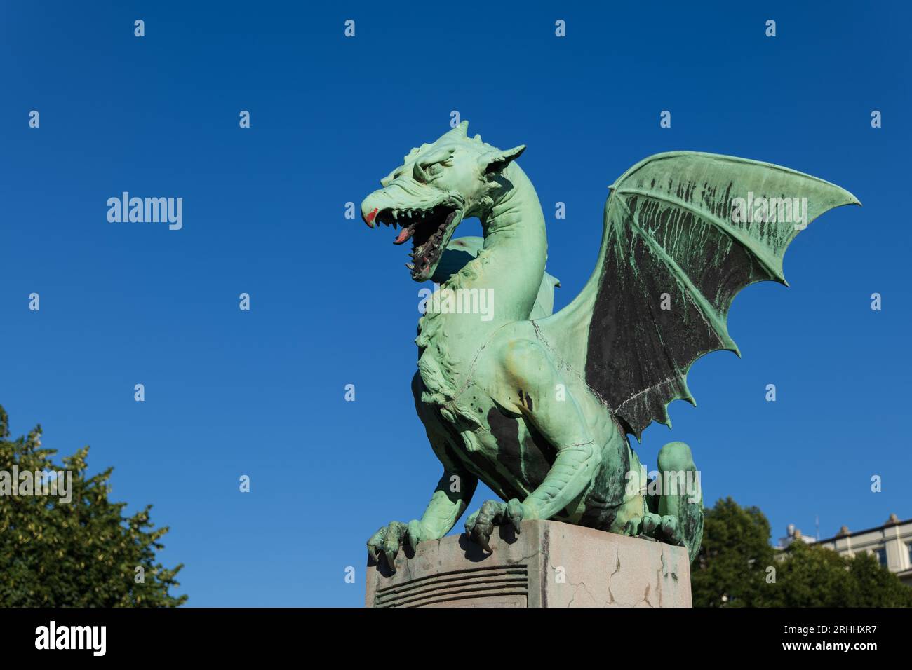The Dragon statue on the Dragon Bridge in Ljubljana, Slovenia. The dragon relates to famous legend of Jason and the Argonauts. Stock Photo