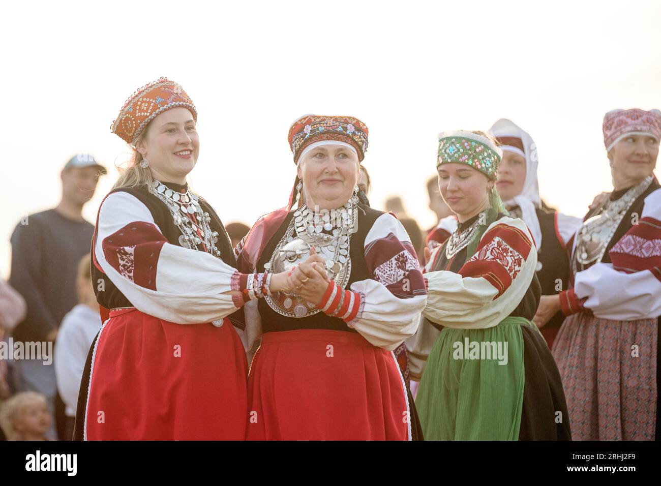 Women in traditional seto estonian costumes dancing, celebrating ...