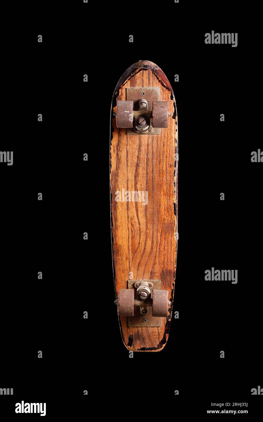 studio still life vintage antique wooden skateboard from the 60's with