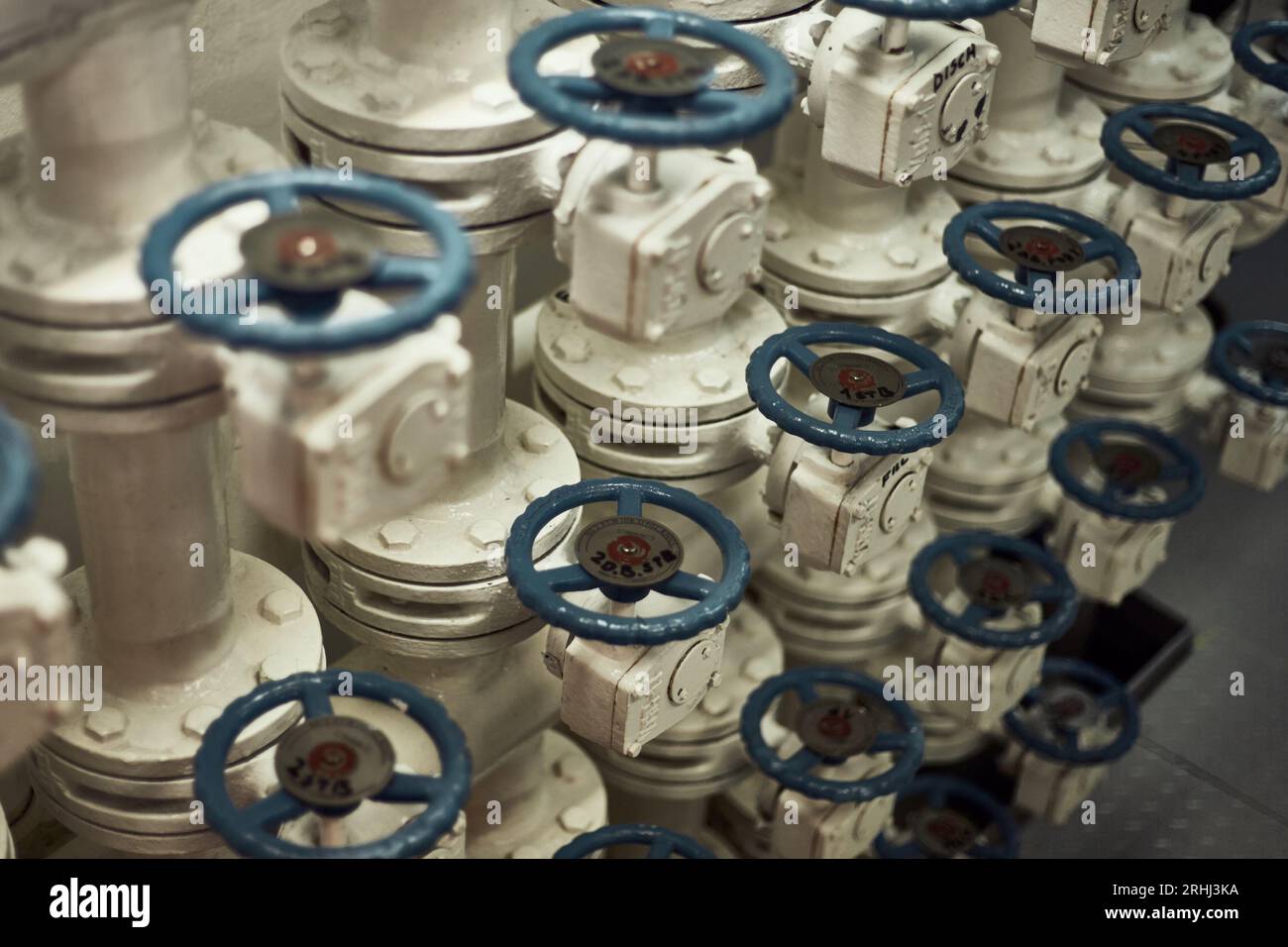 Butterfly valves manifold in engine room for fuel oil transfer cargo operations with blue valve