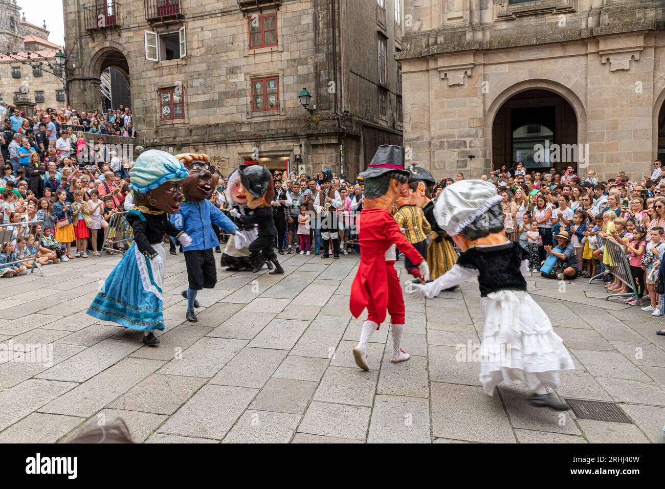 Santiago de Compostela, Spain. The giant heads of the Desfile de Cabezudos (Giant Heads Parade) on Dia del Apostol (Apostle Day) Stock Photo