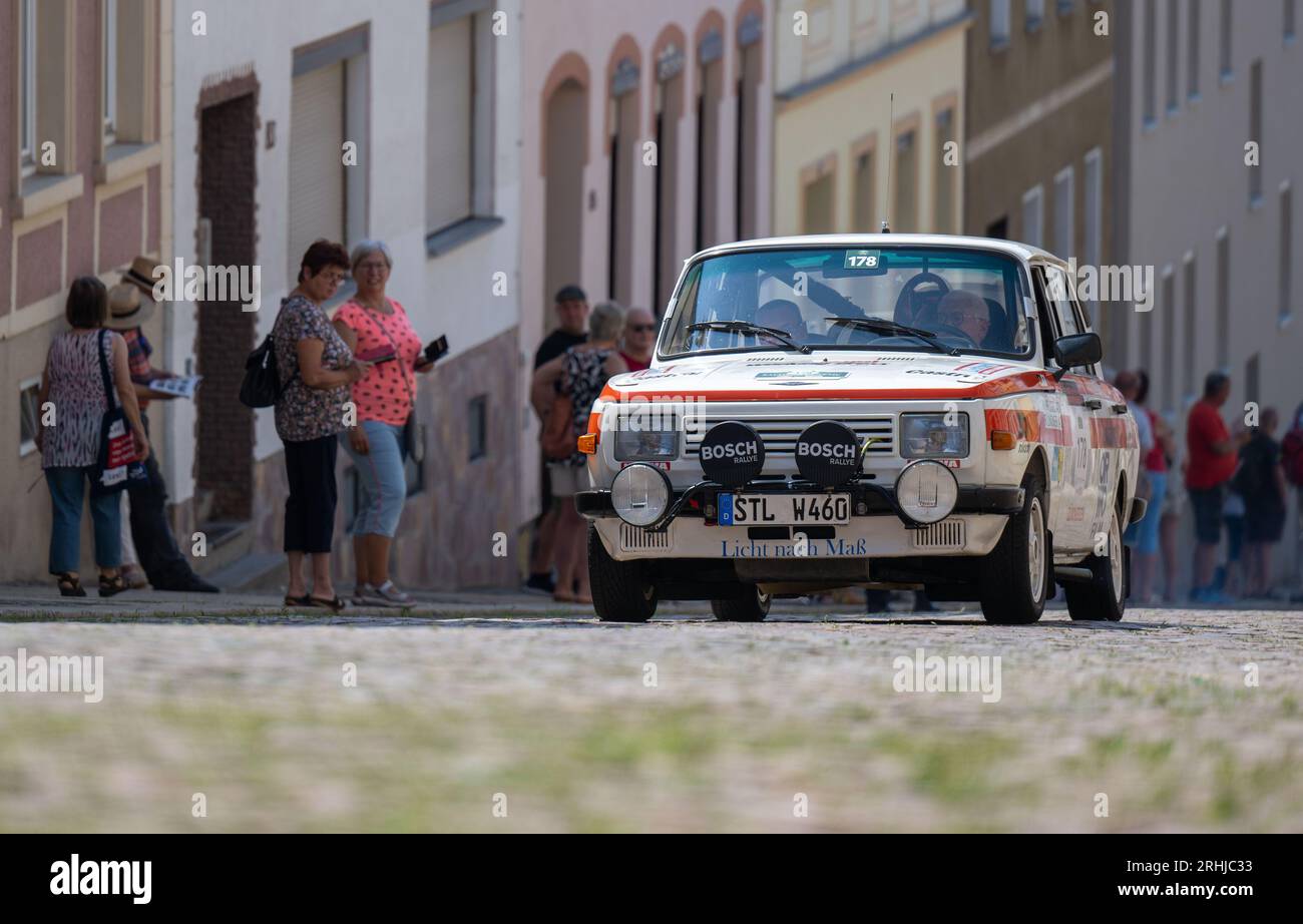 17 August 2023, Saxony, Meerane: A 1987 Wartburg 353 W 460 drives up the legendary Steile Wand in Meerane on the first stage of the Sachsen Classic classic car rally. Around 180 starters from several countries have registered for the 20th edition of the high-horsepower spectacle. On the first day of the 540-kilometer tour, 45 historic motorcycles joined them. From Zwickau, the tour will travel through the Ore Mountains to Dresden and eastern Saxony, with a detour to the Czech Republic. The finale will take place on Saturday, again in Dresden. The organizer is Motor Presse Stuttgart. Photo: Hen Stock Photo
