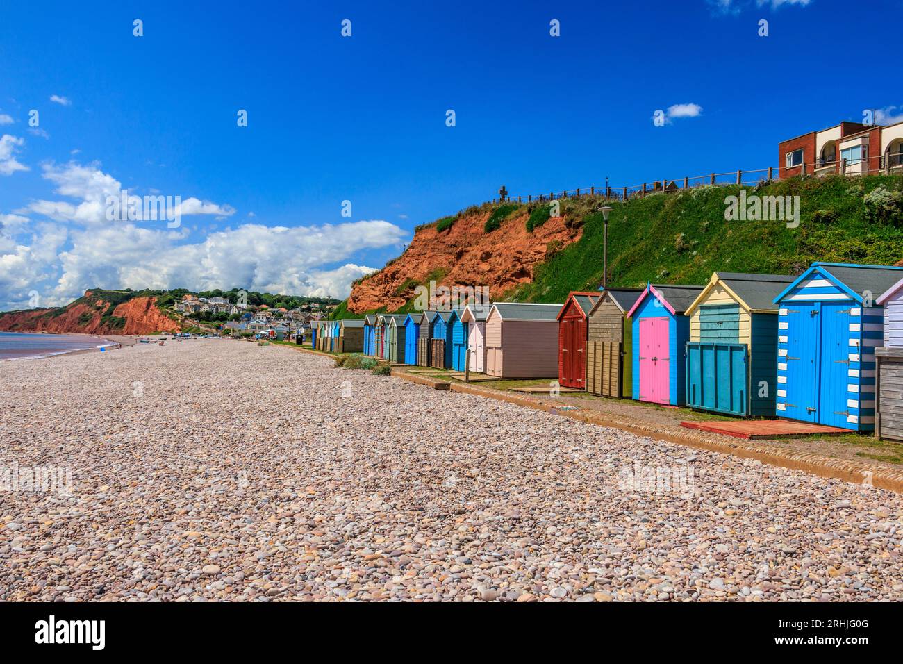 Colourful beach huts on the seafront at at Budleigh Salterton on the