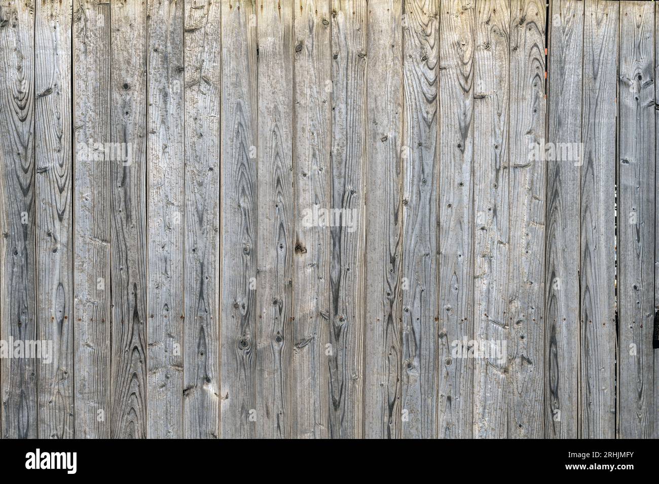 Background from a worn brown plank wall Stock Photo