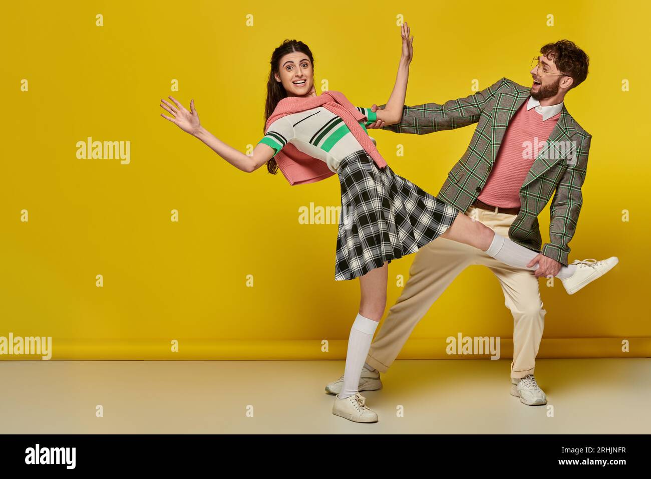 Funny young couple catching hi-res stock photography and images - Alamy