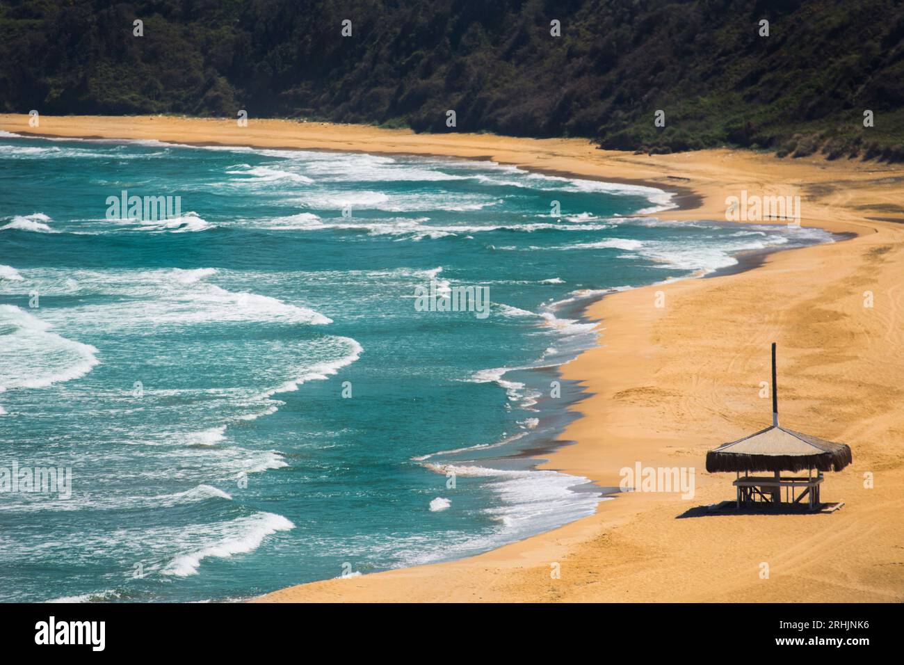 Distant view of an empty sand beach with waves and no people in Sile Istanbul TURKEY Stock Photo