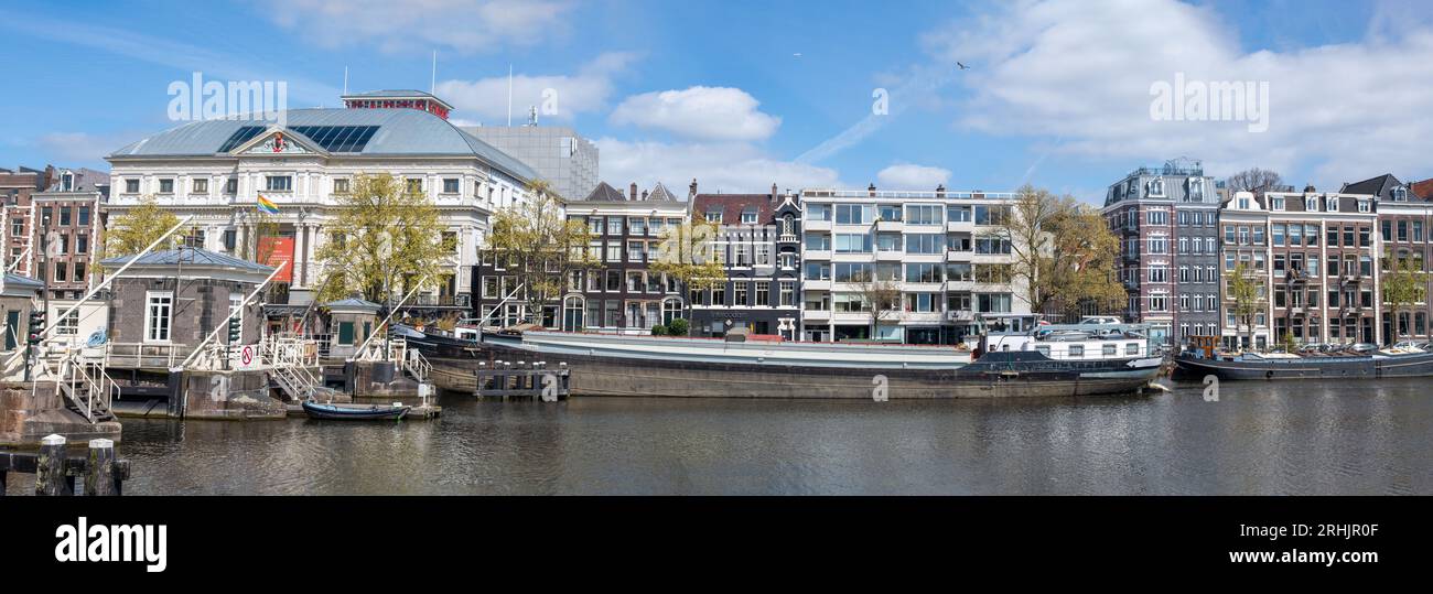 Cargo vessel on the Amstel river Stock Photo