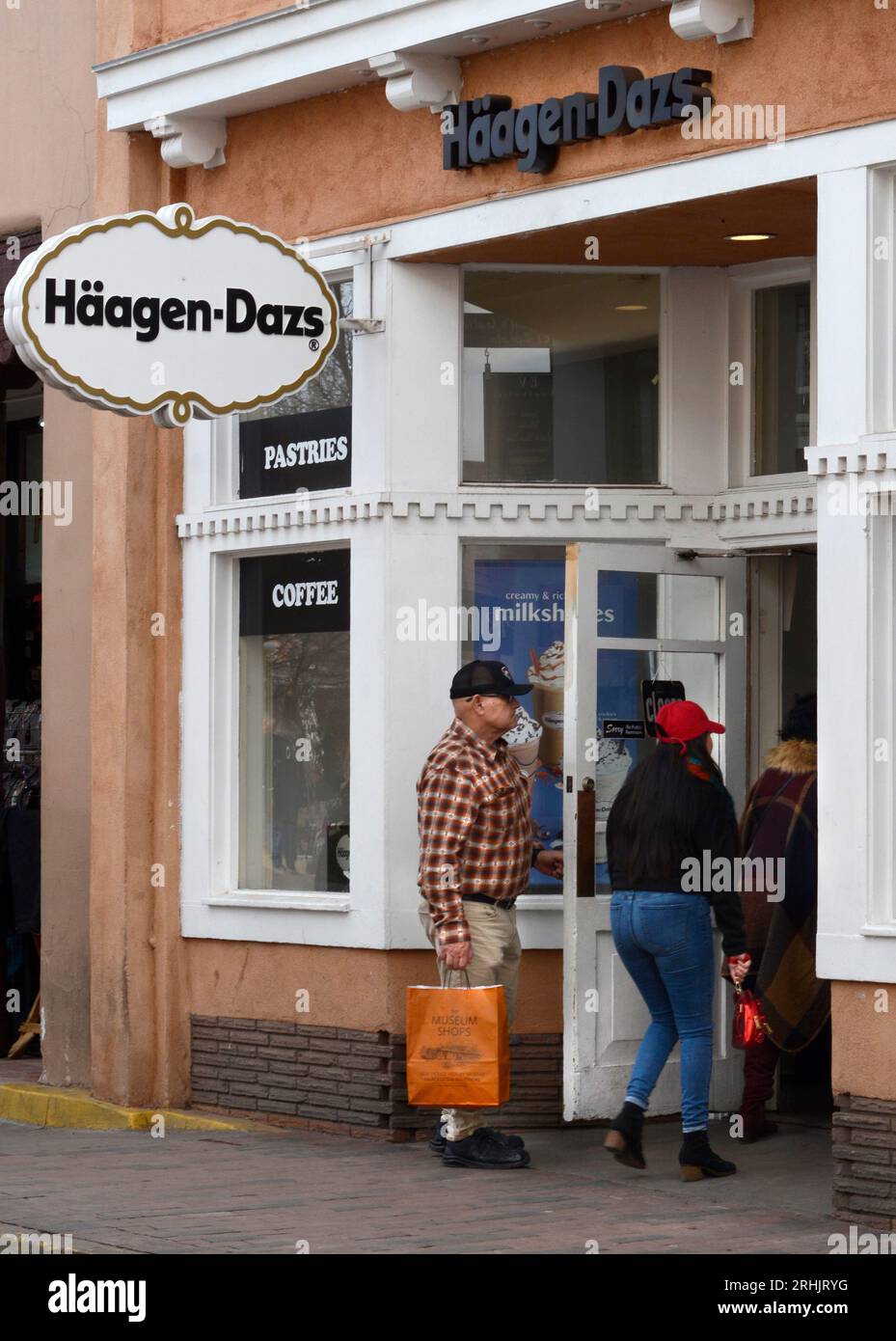 Tourists enter a HaagenDazs ice cream shop in Santa Fe, New Mexico