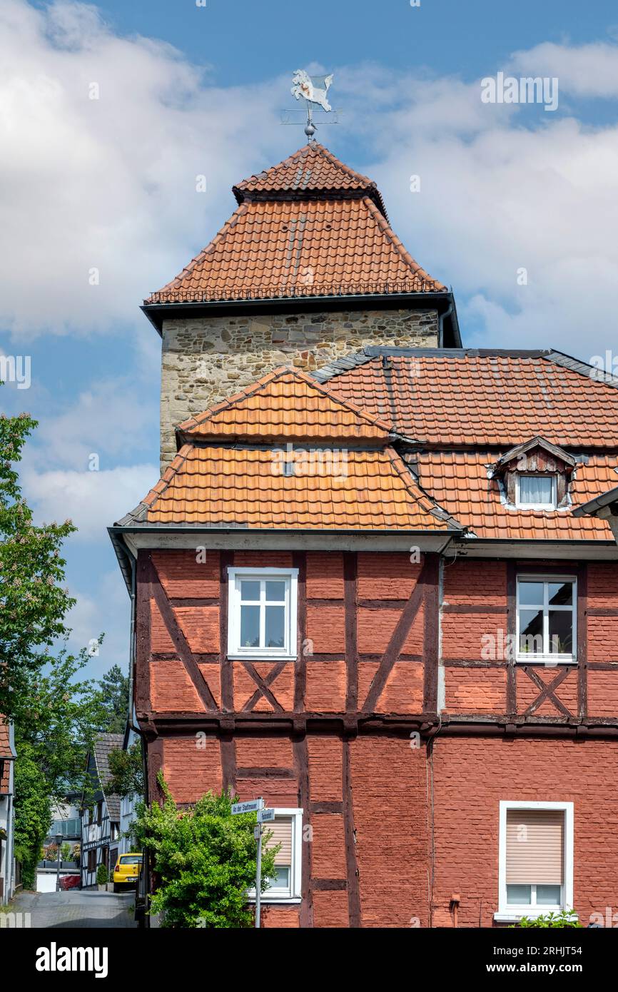 Deutschland, NRW, Märkischer Kreis, Menden, ehemalige Seilerei, dahinter der Teufelsturm Stock Photo