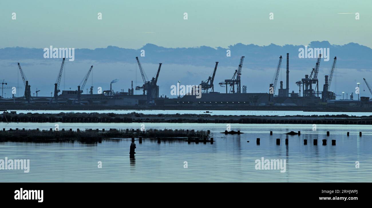 View of docks with a blue background (cranes silhouette Stock Photo - Alamy