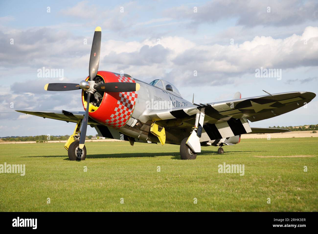 A world war two P-47 Thunderbolt 'Nellie B' fighter plane on Duxford on static display, July 2023 Stock Photo
