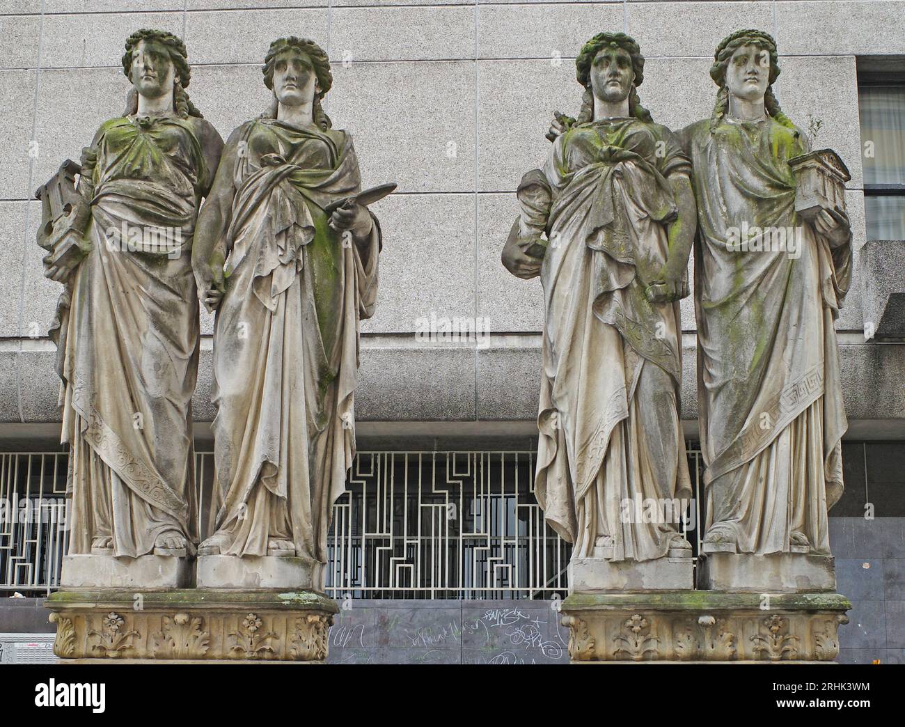 Düsseldorf, Germany - Aug 2 2023 Four oversized sandstone statues of the Caryatids that originally graced the facade of the war-destroyed museum. They Stock Photo