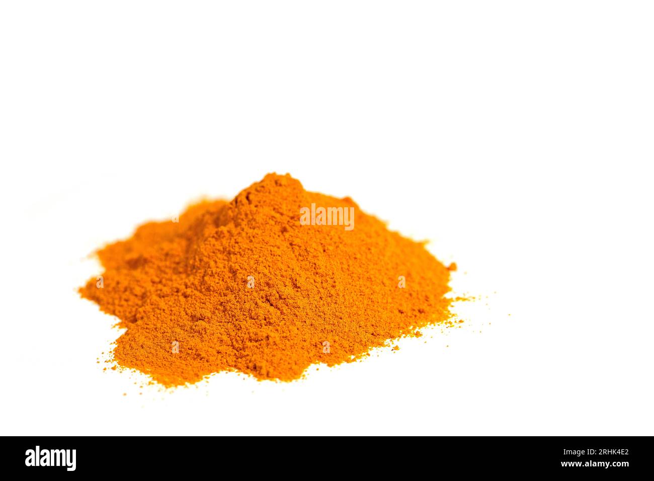 Ground turmeric root against white background Stock Photo