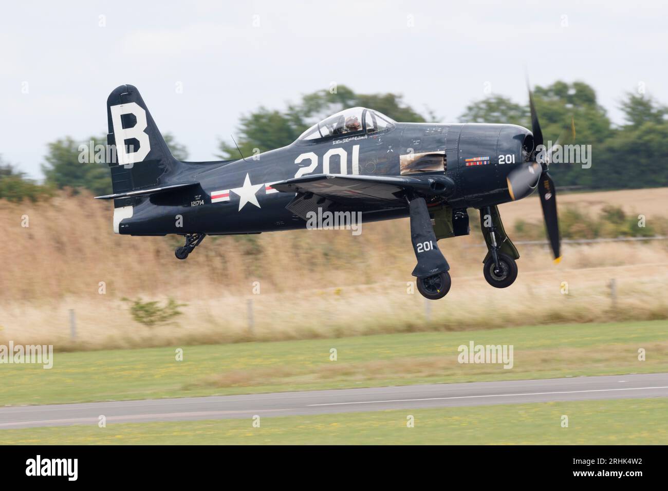 A vintage USA Bearcat fighter plane on a flying display at RAF Duxford airshow, July 2023 Stock Photo