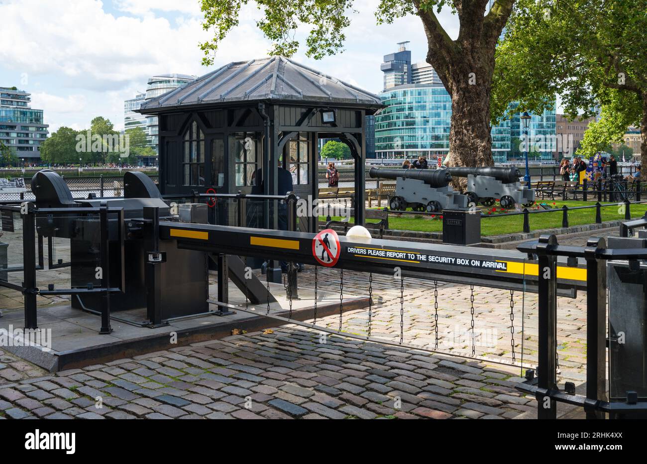 Security cabin and gate at the entrance to Tower Wharf. Tower of London, England, UK Stock Photo
