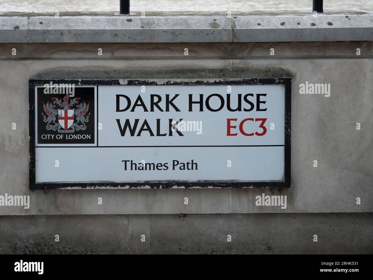 Thames Path walkway name sign on Thames riverside wall for Dark House Walk. London, England, UK Stock Photo