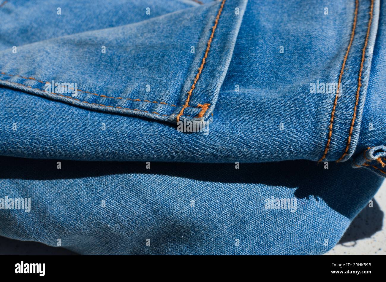 Sewing lines closeup of a pair of jeans, showing the care and skill in