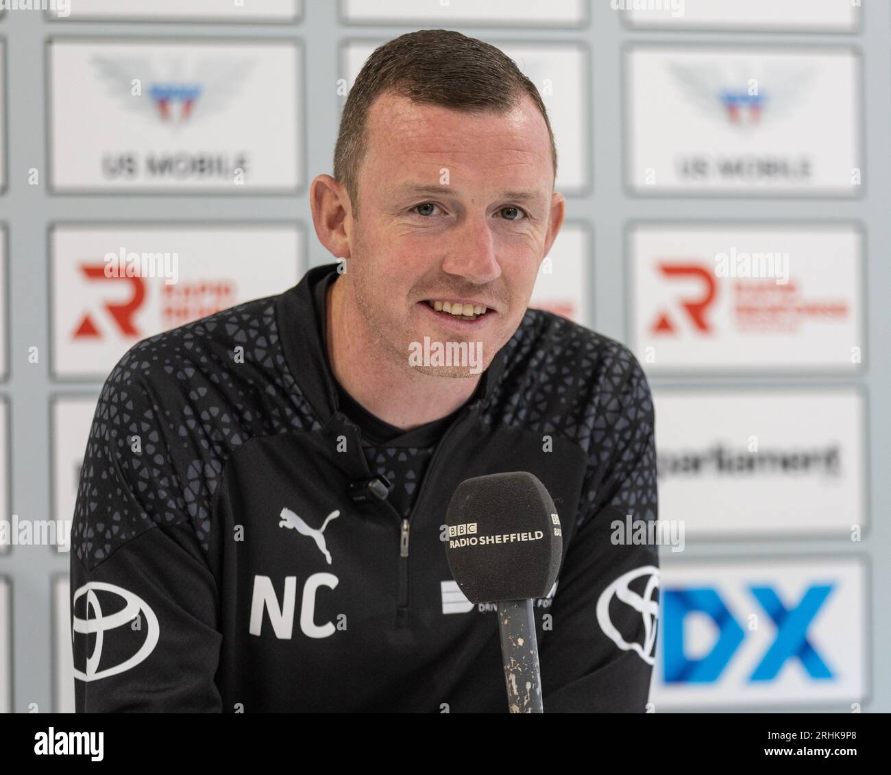 Neill Collins Head coach of Barnsley speaks in the Barnsley vs Oxford