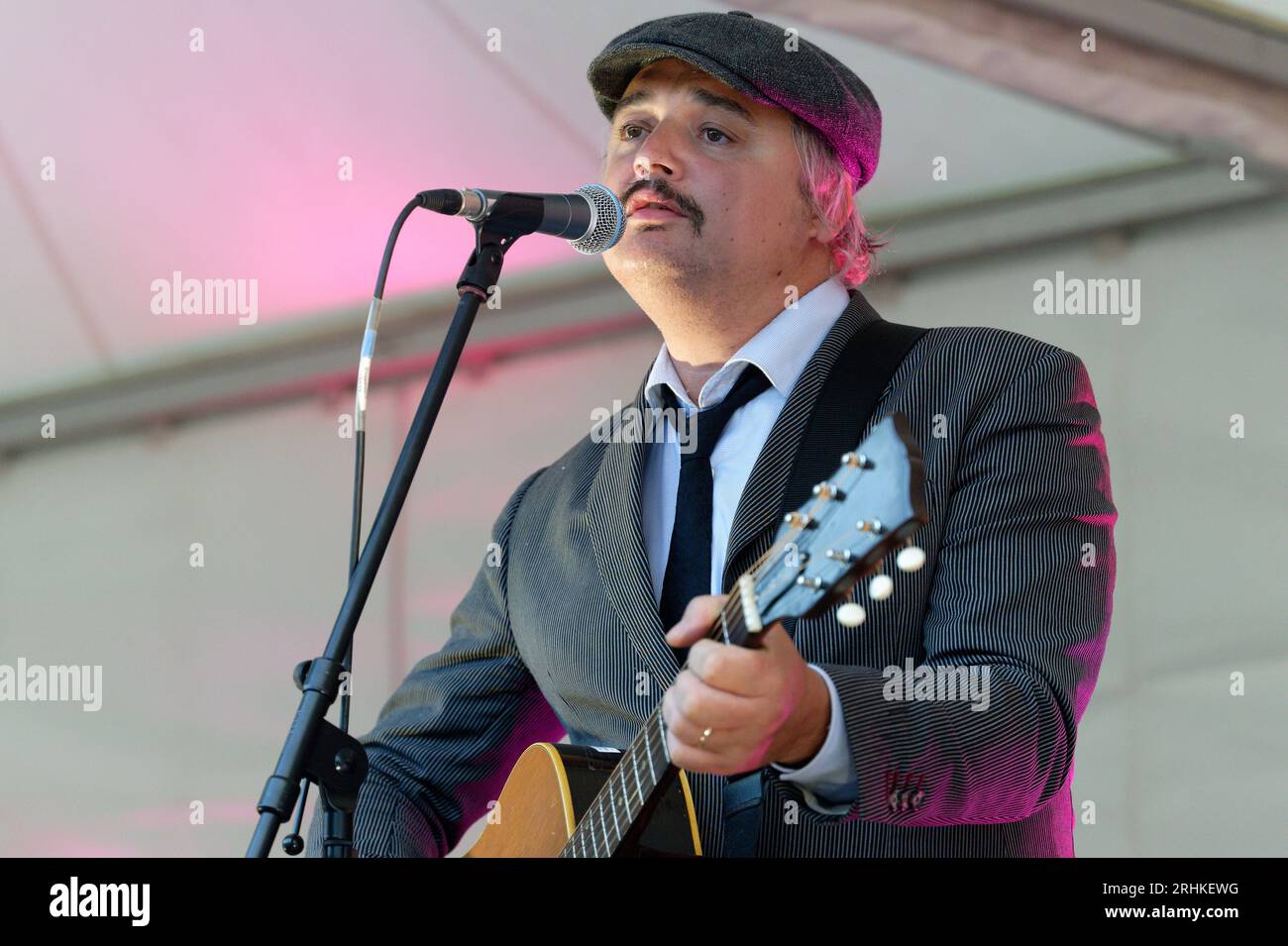 Duesseldorf, Germany. 17th Aug, 2023. Artist Peter Doherty stands on a stage in front of the museum at the opening of the Beyond Fame exhibition at the NRW-Forum. Credit: Henning Kaiser/dpa/Alamy Live News Stock Photo