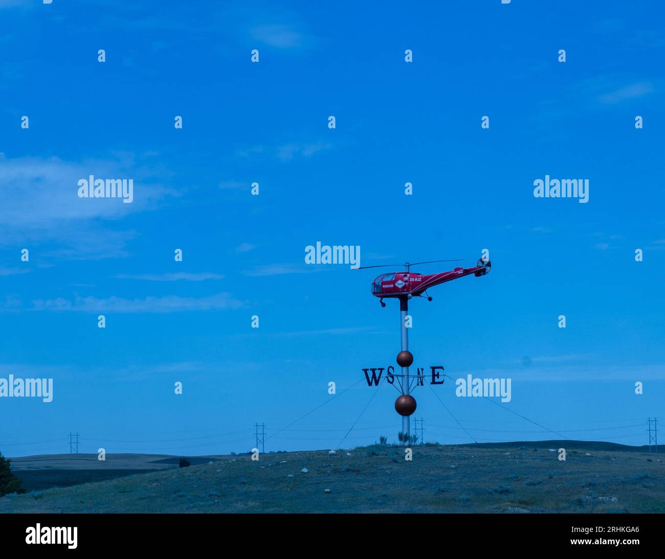 A life sized helicopter weather vane near Swift Current Saskatchewan. Stock Photo