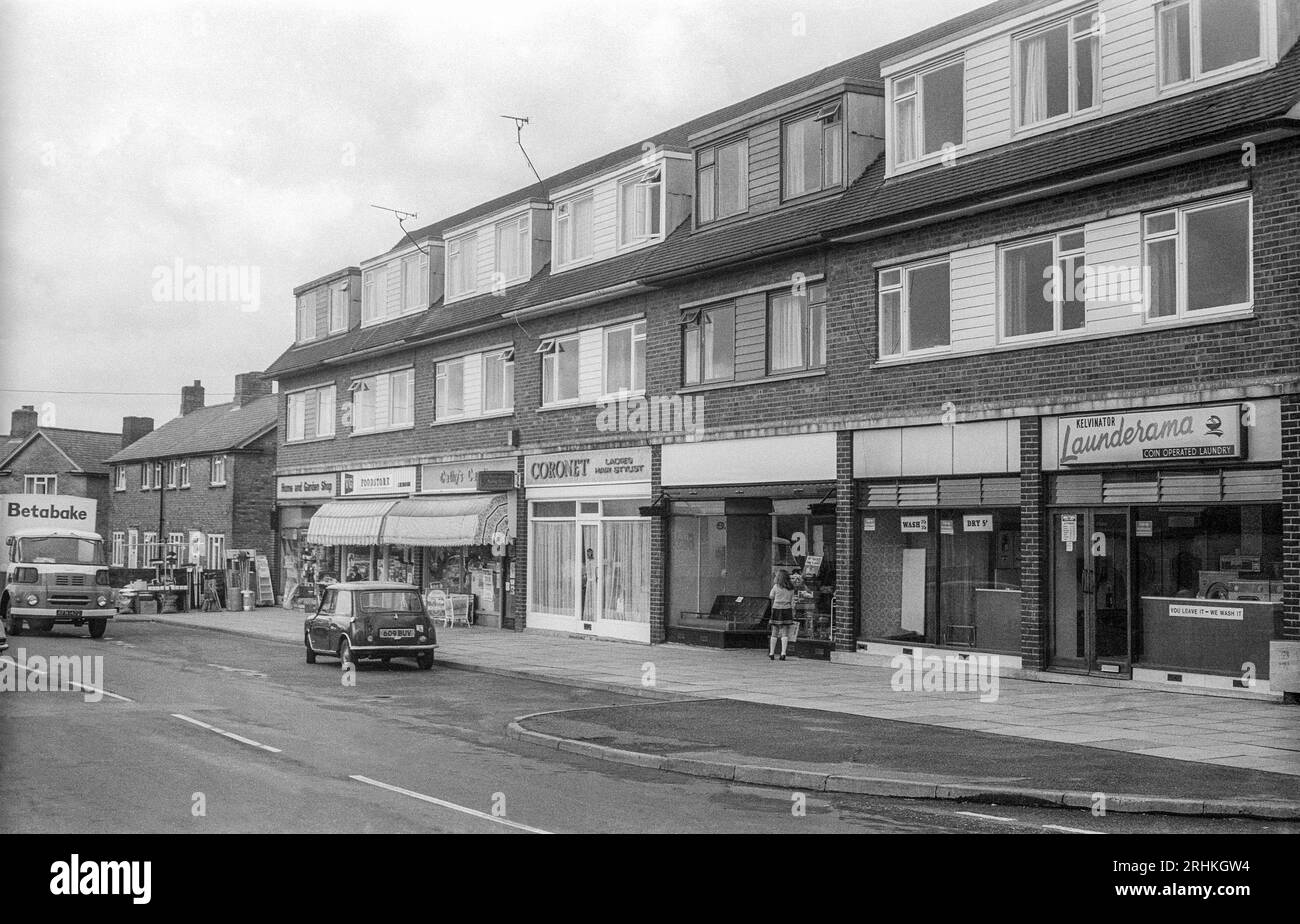 1974 black & white archive image of a terrace of local shops at Hunter Avenue in Willesborough, originally a village but now a residential suburb of Ashford, Kent. Stock Photo