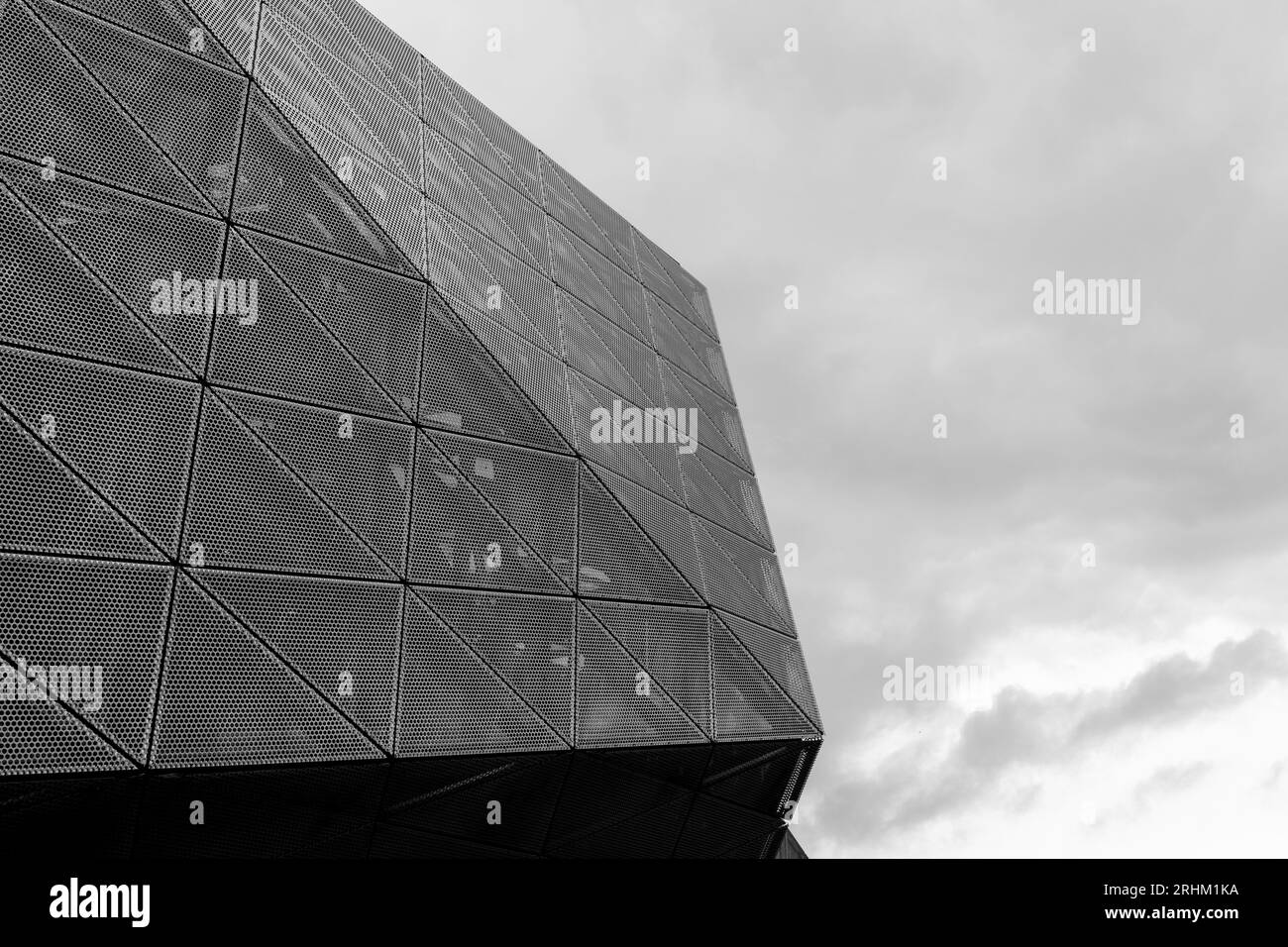 Black and white tone, Exterior view of mixture various  triangular pattern of aluminium cladding facade. Stock Photo