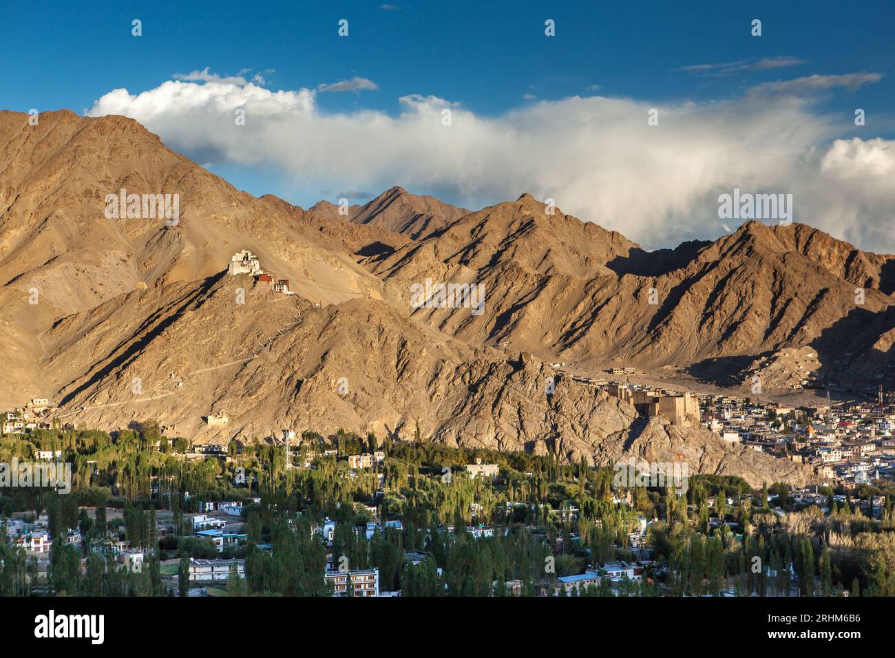 Sunset in Leh, Ladakh, India. Beautiful mountain landscape with temple in the hill above Leh town. Stock Photo