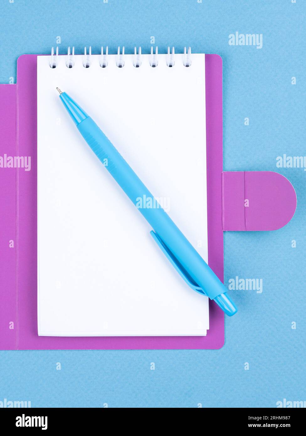 Design concept - top view of notepad with white sheets, bookmarks ...