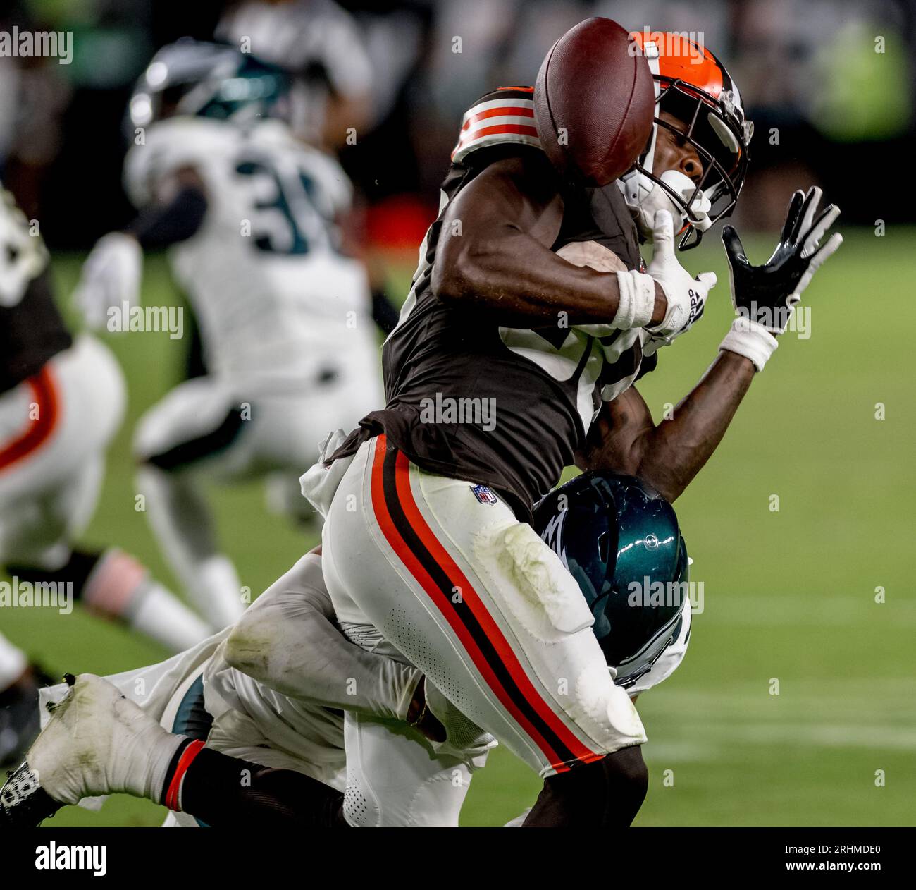 Philadelphia, USA. 17th Aug, 2023. August 17, 2023, Philadelphia, PA, USA:  August 17, 2023: Cleveland Browns running back Hassan Hall (30) has the  ball knocked loose on a hit during the NFL