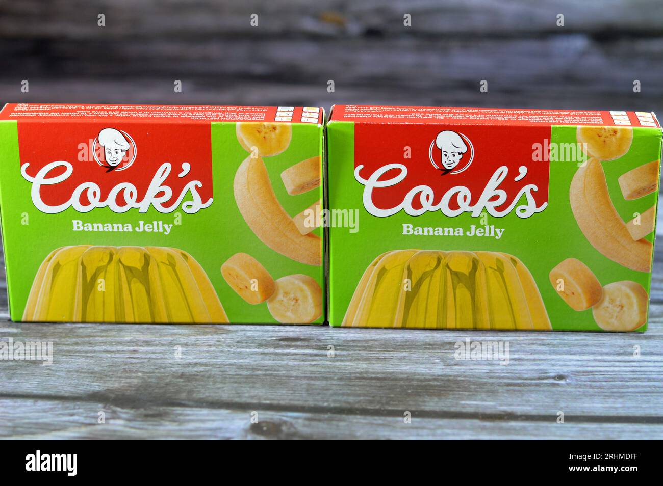 Cairo, Egypt, July 25 2023: Cook's Jelly banana pack, sweet red jelly pudding banana flavored, selective focus of chilled red bananas jelly dessert, G Stock Photo