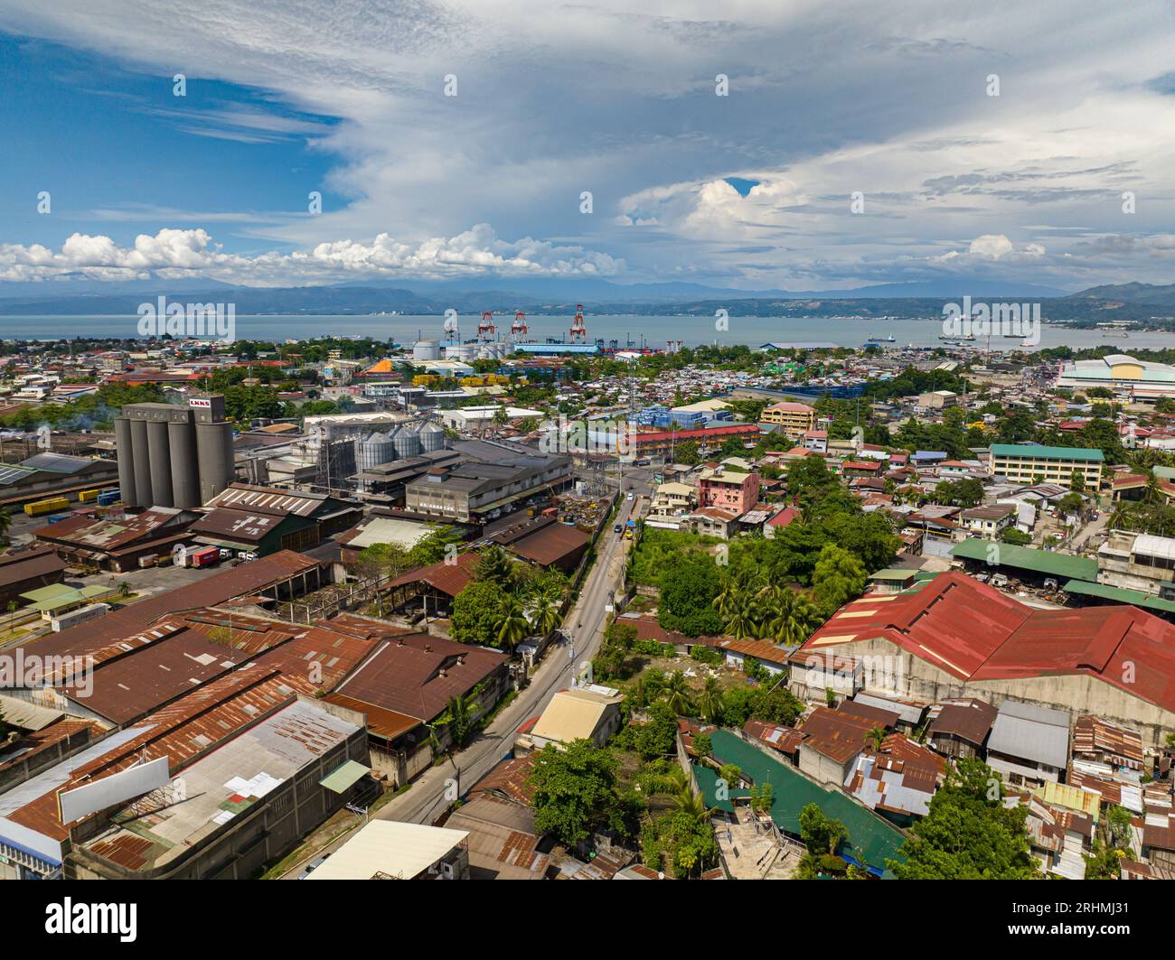Modern buildings and residential area in City of Cagayan de Oro. Blue sky and clouds. Mindanao, Philippines. Stock Photo