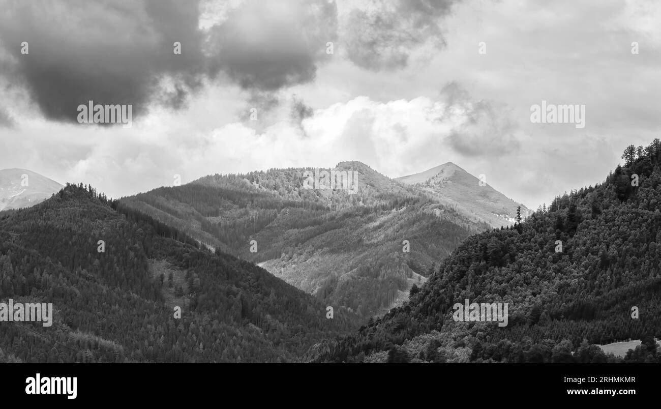 Alps mountains in stormy clouds, in black and white Stock Photo - Alamy