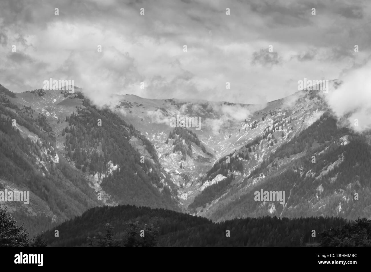 Alps mountains in stormy clouds, in black and white Stock Photo - Alamy
