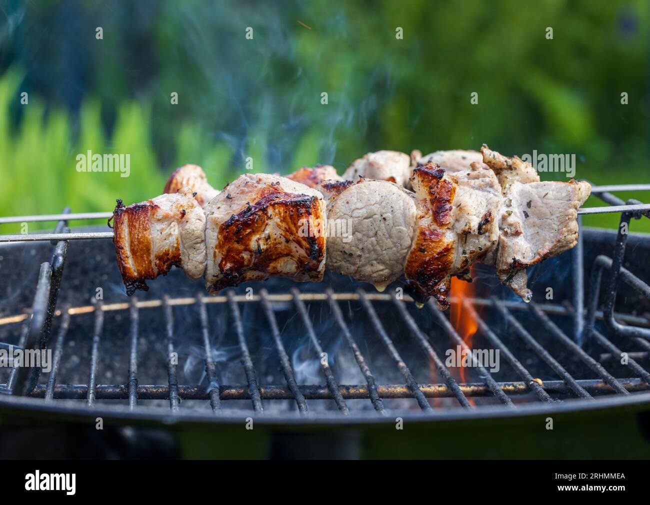 grilled marinated pork meat skewers on charcoal grill Stock Photo - Alamy