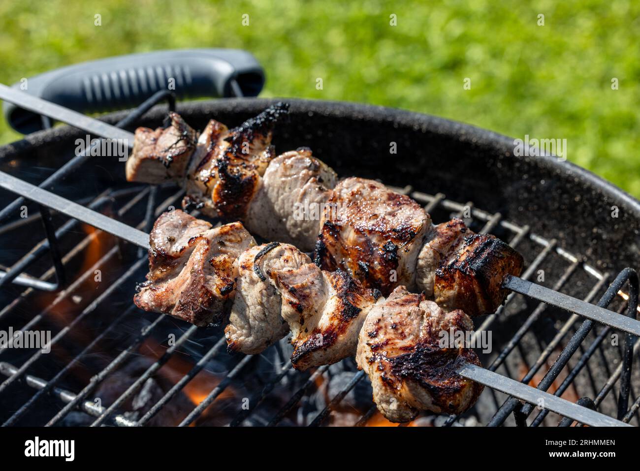 grilled marinated pork meat skewers on charcoal grill Stock Photo - Alamy