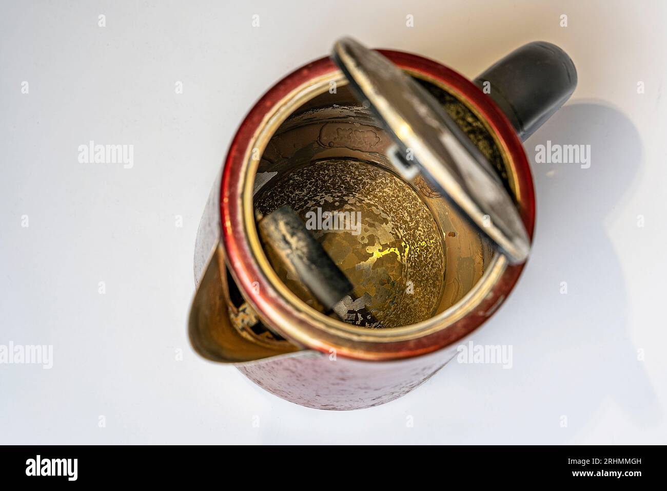 Formation of calciummagnesium deposits on the heating element, bottom and walls of the kettle