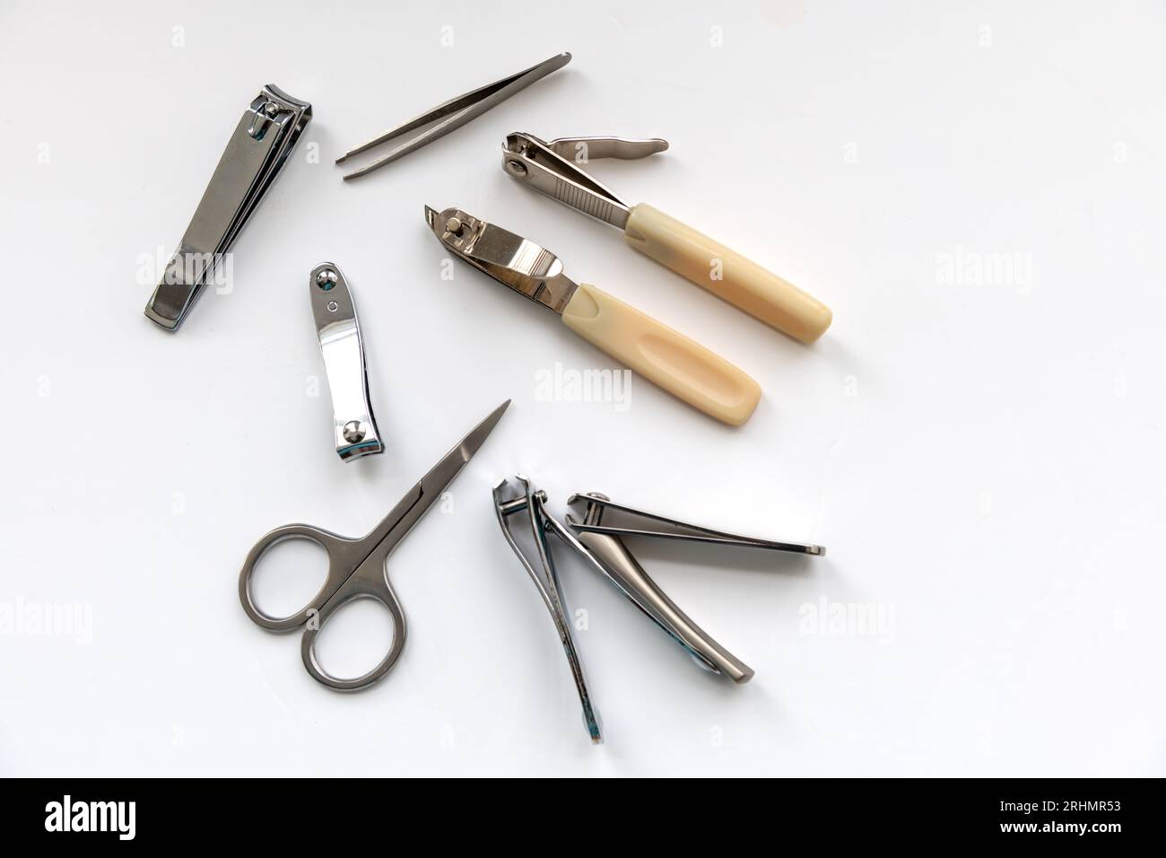Nail clippers and scissor isolated in white Stock Photo Alamy