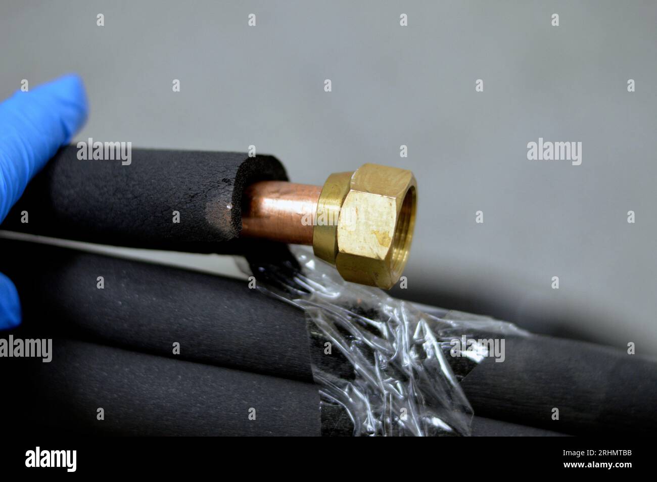 Air conditioning copper pipes tubes covered with black rubber, copper