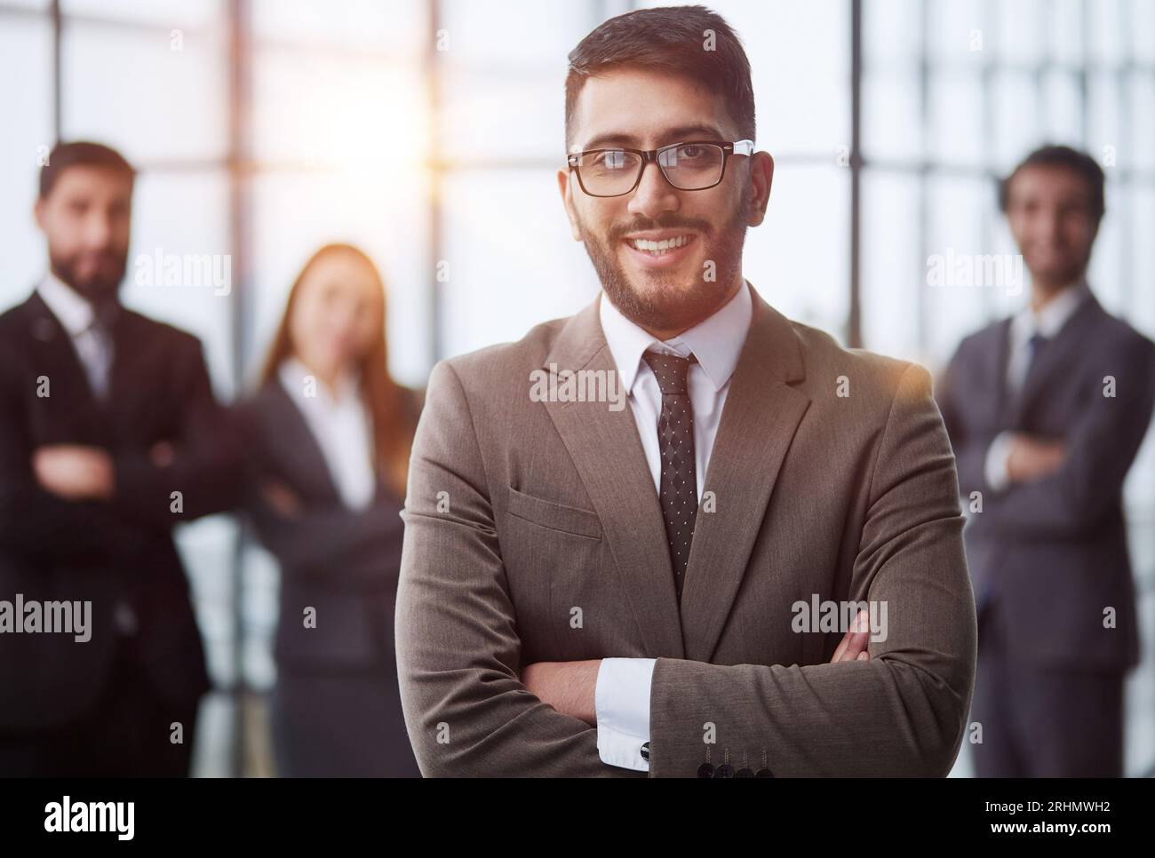 Business people stand on the background of the office corridor Stock ...