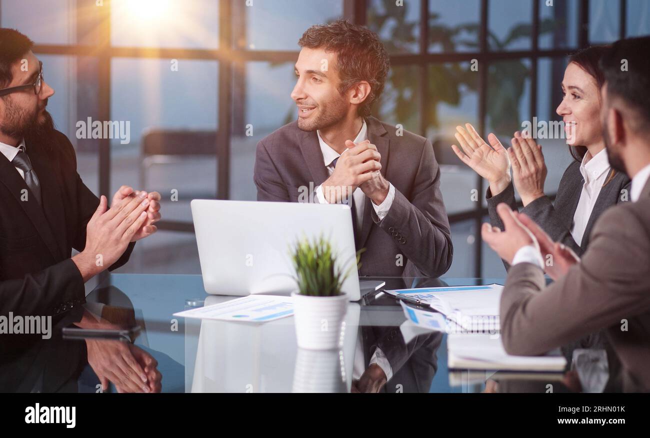 Teamwork - discussion in the office. young and successful Stock Photo ...