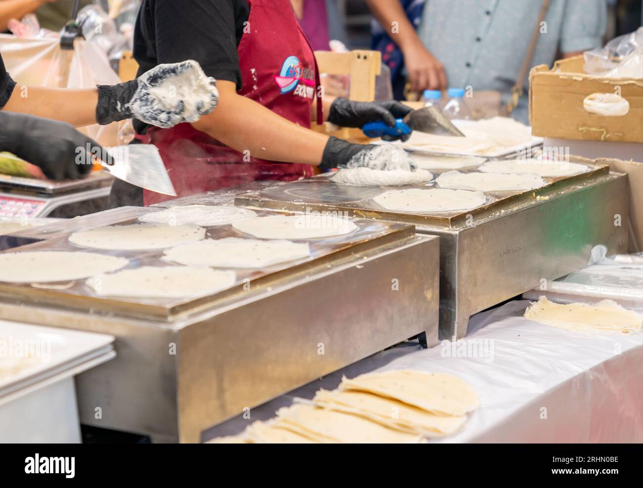 Hot crepes in a pan on a hot pan in the street market Stock Photo Alamy
