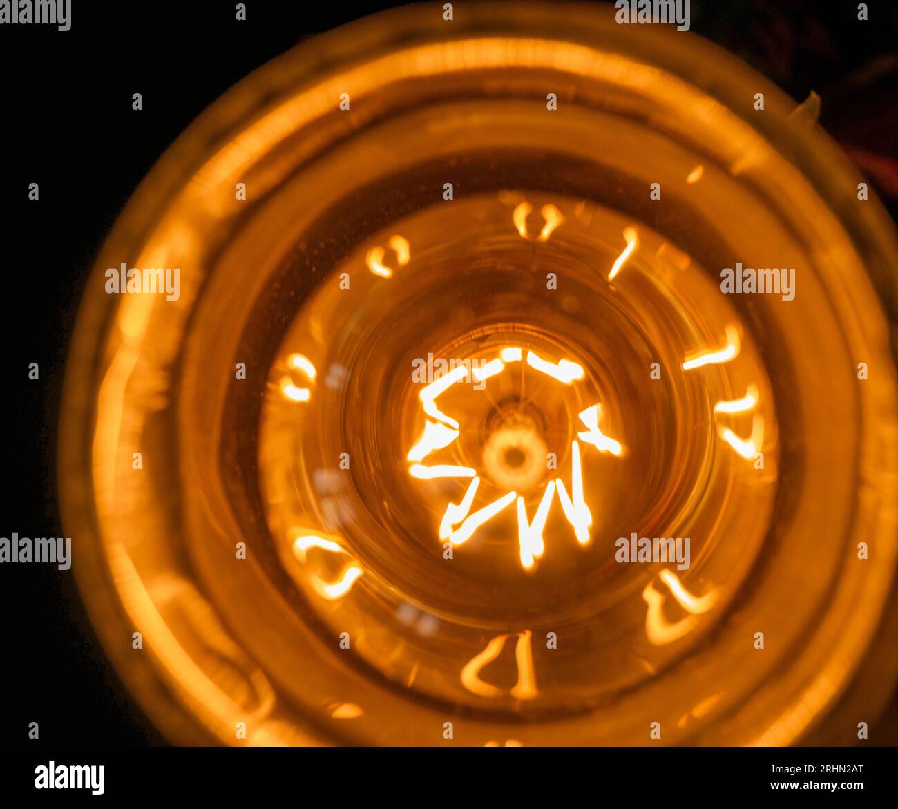 Lamp close view background, light bulb over black background Stock