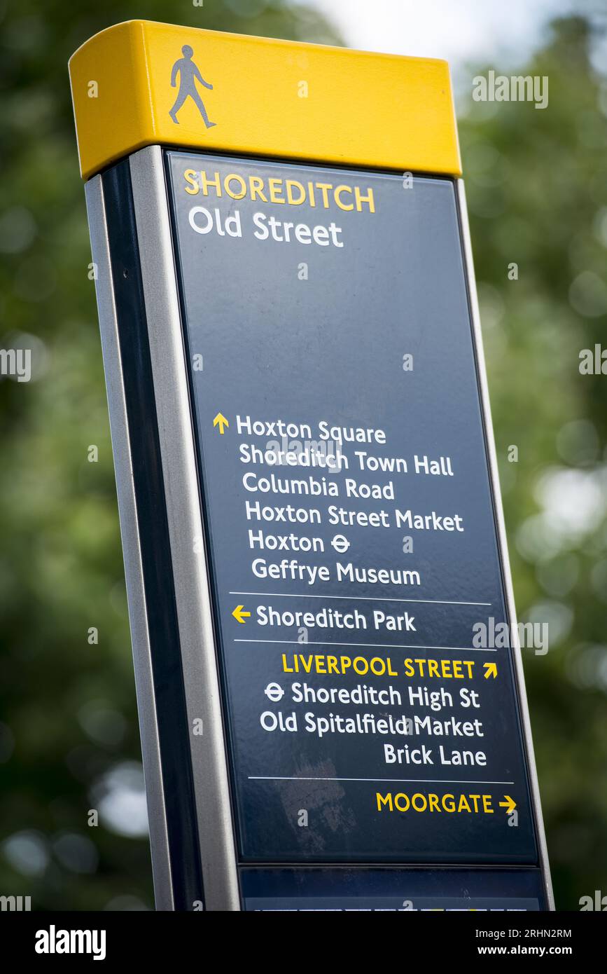 Shoreditch Old Street pedestrian signpost in East London pointing to local landmarks and destinations including Hoxton, Brick Lane and Moorgate. Stock Photo